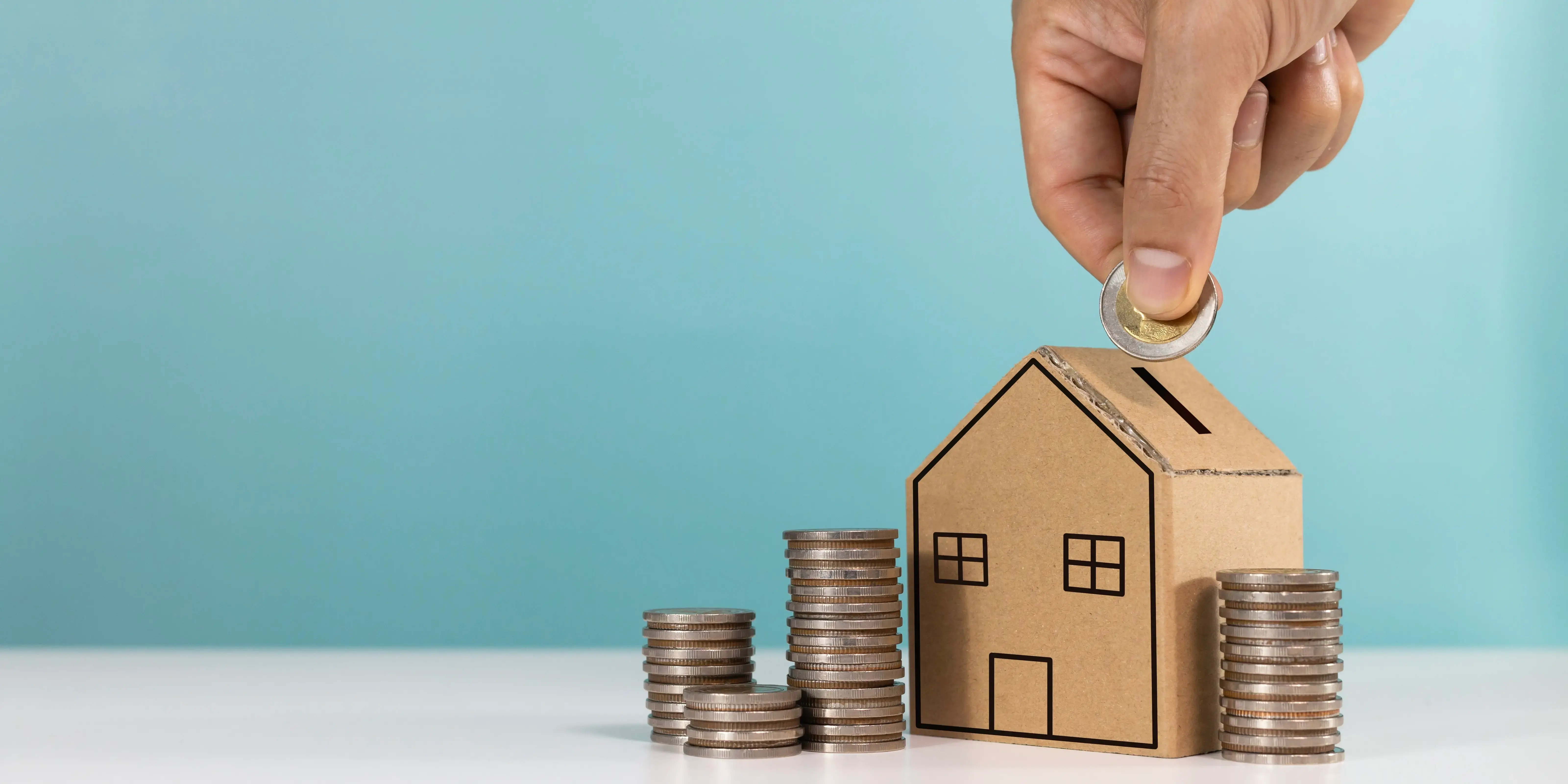 Alcancía en forma de casa. Dejar de rentar y comprar casa